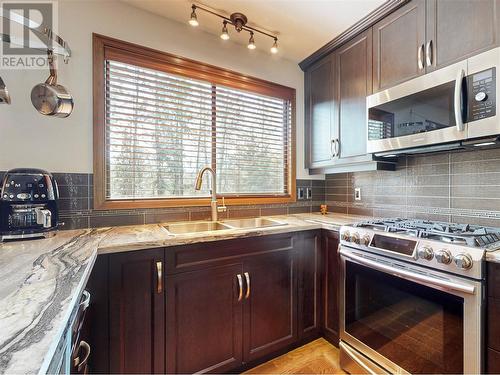 3999 Eastwood Court, Kelowna, BC - Indoor Photo Showing Kitchen With Double Sink