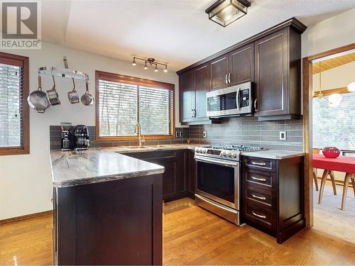 3999 Eastwood Court, Kelowna, BC - Indoor Photo Showing Kitchen With Double Sink