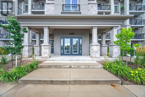 403 - 1460 Main Street E, Milton (Dempsey), ON - Outdoor With Balcony With Facade