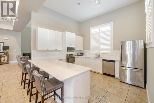 403 - 1460 Main Street E, Milton (Dempsey), ON - Indoor Photo Showing Kitchen