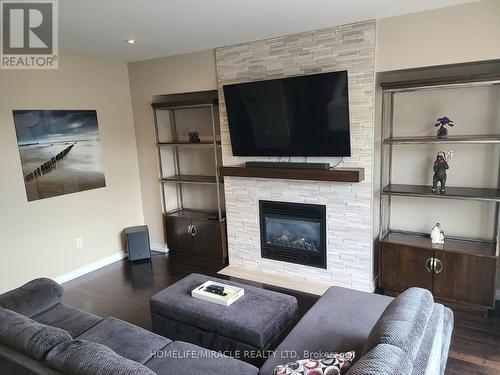 118 Painter Terrace, Hamilton (Waterdown), ON - Indoor Photo Showing Living Room With Fireplace