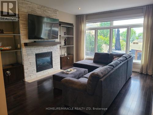 118 Painter Terrace, Hamilton (Waterdown), ON - Indoor Photo Showing Living Room With Fireplace