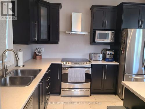 118 Painter Terrace, Hamilton (Waterdown), ON - Indoor Photo Showing Kitchen With Double Sink