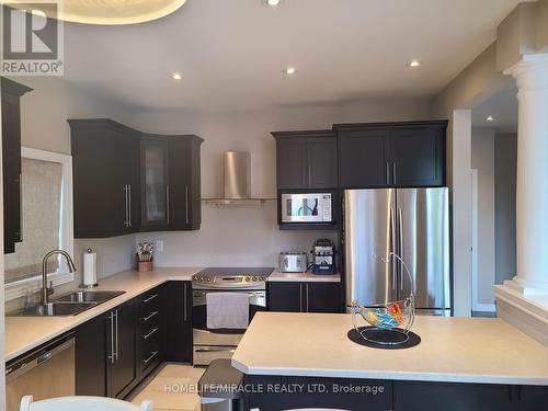 118 Painter Terrace, Hamilton (Waterdown), ON - Indoor Photo Showing Kitchen With Double Sink