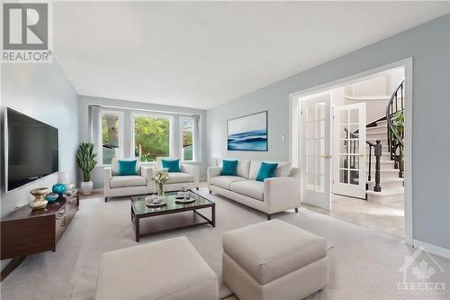 This photo has been virtually staged. - 839 Adencliffe Drive, Ottawa, ON - Indoor Photo Showing Living Room