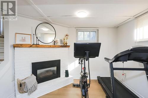 37 Grandview Ave, Sault Ste. Marie, ON - Indoor Photo Showing Gym Room With Fireplace