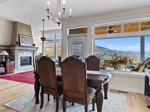 996 Quails Roost Crt, Kamloops, BC - Indoor Photo Showing Dining Room With Fireplace