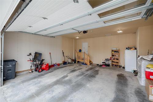 29 Oak Bridge Way, East St Paul, MB - Indoor Photo Showing Garage