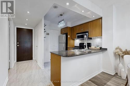 111 - 28 William Carson Crescent, Toronto (St. Andrew-Windfields), ON - Indoor Photo Showing Kitchen With Double Sink