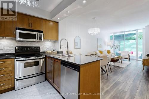 111 - 28 William Carson Crescent, Toronto (St. Andrew-Windfields), ON - Indoor Photo Showing Kitchen With Double Sink