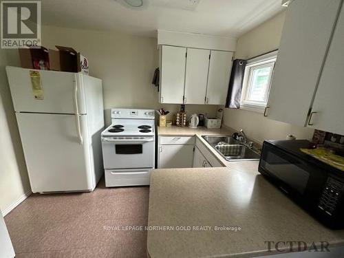 87 Woods Street, Kirkland Lake, ON - Indoor Photo Showing Kitchen With Double Sink