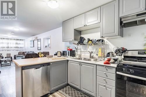 1 - 11 Dennis Avenue, Toronto, ON - Indoor Photo Showing Kitchen With Double Sink