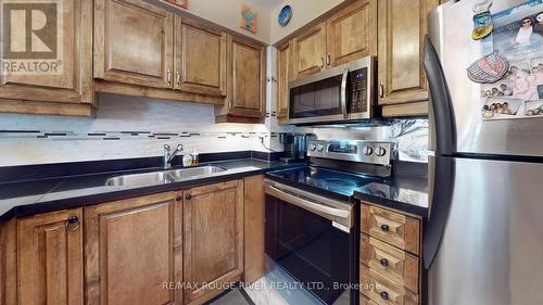 9 - 735 New Westminster Drive, Vaughan (Brownridge), ON - Indoor Photo Showing Kitchen With Double Sink