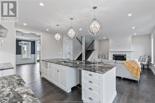 2512 Mayfair South, Lasalle, ON - Indoor Photo Showing Kitchen With Fireplace With Double Sink With Upgraded Kitchen