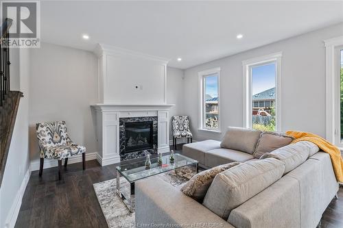 2512 Mayfair South, Lasalle, ON - Indoor Photo Showing Living Room With Fireplace