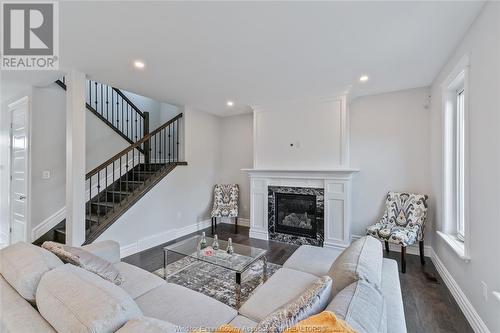 2512 Mayfair South, Lasalle, ON - Indoor Photo Showing Living Room With Fireplace