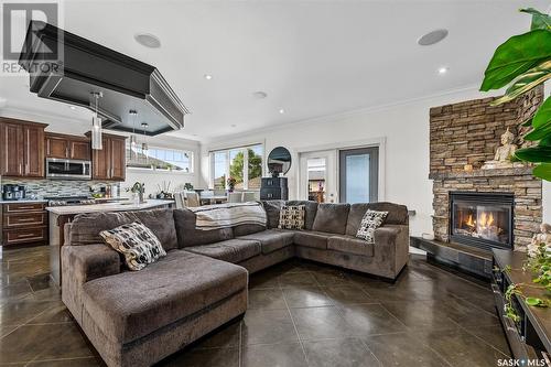 10 Belmont Crescent Sw, Moose Jaw, SK - Indoor Photo Showing Living Room With Fireplace