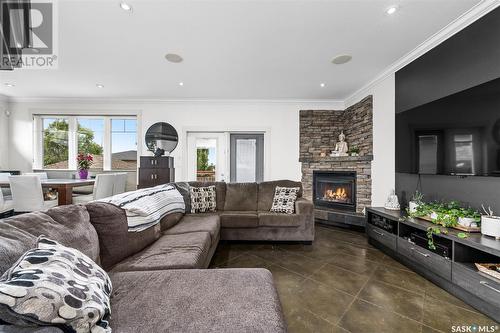 10 Belmont Crescent Sw, Moose Jaw, SK - Indoor Photo Showing Living Room With Fireplace