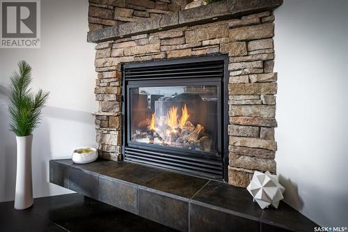 10 Belmont Crescent Sw, Moose Jaw, SK - Indoor Photo Showing Living Room With Fireplace