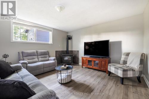 38 Crompton Drive, Barrie (Little Lake), ON - Indoor Photo Showing Living Room With Fireplace