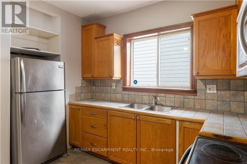 411 Mary Street, Hamilton (North End), ON - Indoor Photo Showing Kitchen With Double Sink