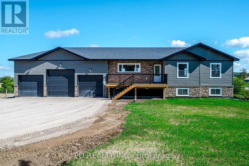 8 Acrevale Road, Kawartha Lakes, ON - Outdoor With Deck Patio Veranda With Facade