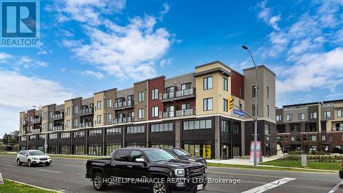 308 - 3401 Ridgeway Drive, Mississauga (Erin Mills), ON - Outdoor With Facade