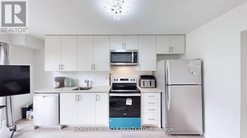 308 - 3401 Ridgeway Drive, Mississauga (Erin Mills), ON - Indoor Photo Showing Kitchen