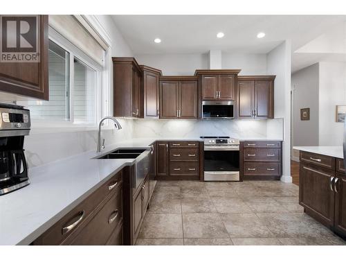 2582 St Andrews Street, Blind Bay, BC - Indoor Photo Showing Kitchen With Double Sink With Upgraded Kitchen