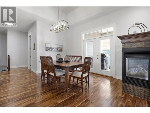 2582 St Andrews Street, Blind Bay, BC - Indoor Photo Showing Dining Room With Fireplace