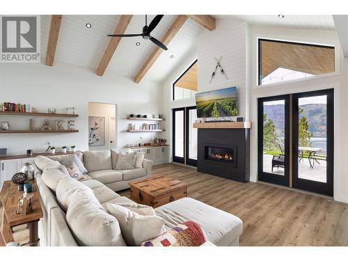 10833 Hare Road, Lake Country, BC - Indoor Photo Showing Living Room With Fireplace