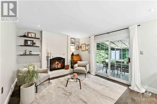 13 Beechmont Crescent, Ottawa, ON - Indoor Photo Showing Living Room With Fireplace