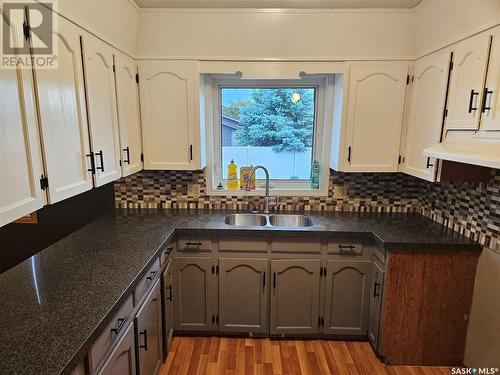 100 Alexander Street, Wawota, SK - Indoor Photo Showing Kitchen With Double Sink