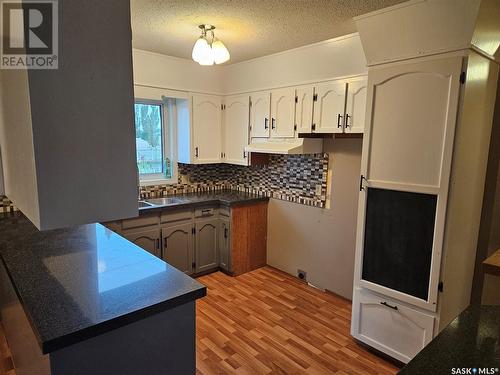 100 Alexander Street, Wawota, SK - Indoor Photo Showing Kitchen With Double Sink