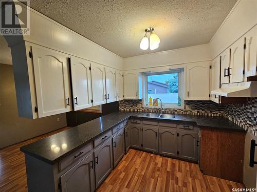 100 Alexander Street, Wawota, SK - Indoor Photo Showing Kitchen With Double Sink