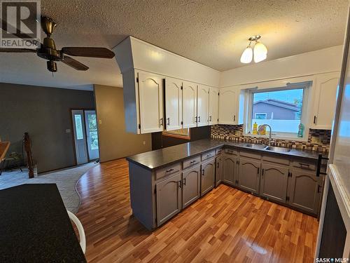 100 Alexander Street, Wawota, SK - Indoor Photo Showing Kitchen With Double Sink