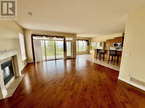 700 South Crest Drive Unit# 5 Lot# 5, Kelowna, BC - Indoor Photo Showing Living Room With Fireplace