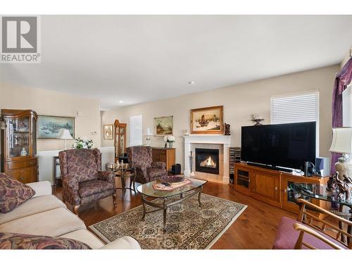 700 South Crest Drive Unit# 5 Lot# 5, Kelowna, BC - Indoor Photo Showing Living Room With Fireplace