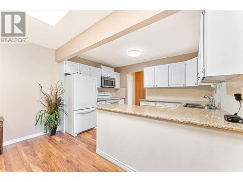 2110 Hoy Street Unit# 308, Kelowna, BC - Indoor Photo Showing Kitchen With Double Sink