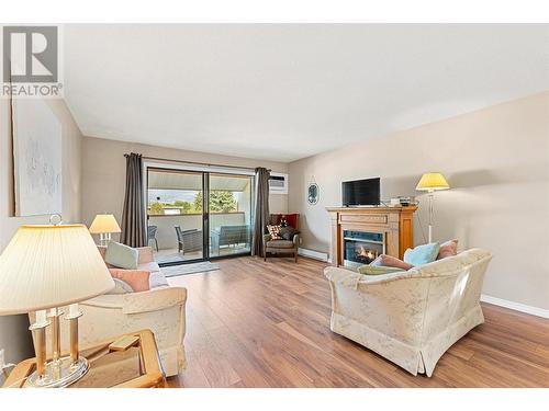 2110 Hoy Street Unit# 308, Kelowna, BC - Indoor Photo Showing Living Room With Fireplace