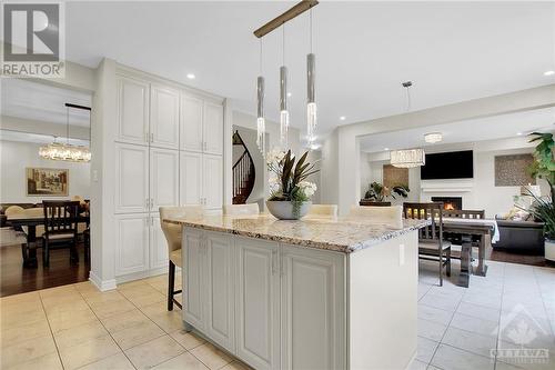 Pantry wall and view towards family room - 915 Guinness Crescent, Ottawa, ON - Indoor Photo Showing Kitchen With Upgraded Kitchen