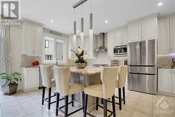 Bright kitchen and island seating - 