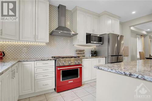 Crisp and clean with a pop of colour - 915 Guinness Crescent, Ottawa, ON - Indoor Photo Showing Kitchen With Upgraded Kitchen