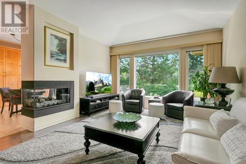 3924 Gallaghers Parkway, Kelowna, BC - Indoor Photo Showing Living Room With Fireplace