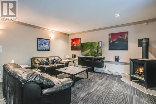 944 Purcell Court, Kelowna, BC - Indoor Photo Showing Living Room With Fireplace