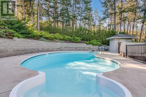 944 Purcell Court, Kelowna, BC - Outdoor With In Ground Pool With Backyard