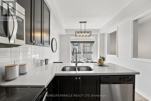 80 Magdalene Crescent, Brampton, ON - Indoor Photo Showing Kitchen With Double Sink