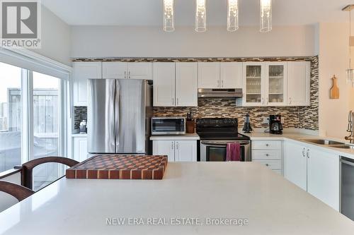 27 Piggott Mews, Toronto (Weston), ON - Indoor Photo Showing Kitchen With Stainless Steel Kitchen With Double Sink