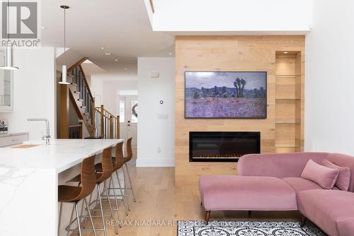 37 - 88 Lakeport Road, St. Catharines, ON - Indoor Photo Showing Living Room With Fireplace