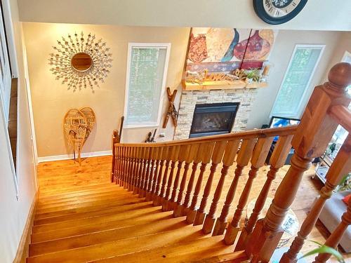 Escalier - 1355 Rue Trudel, Mont-Tremblant, QC - Indoor Photo Showing Other Room With Fireplace